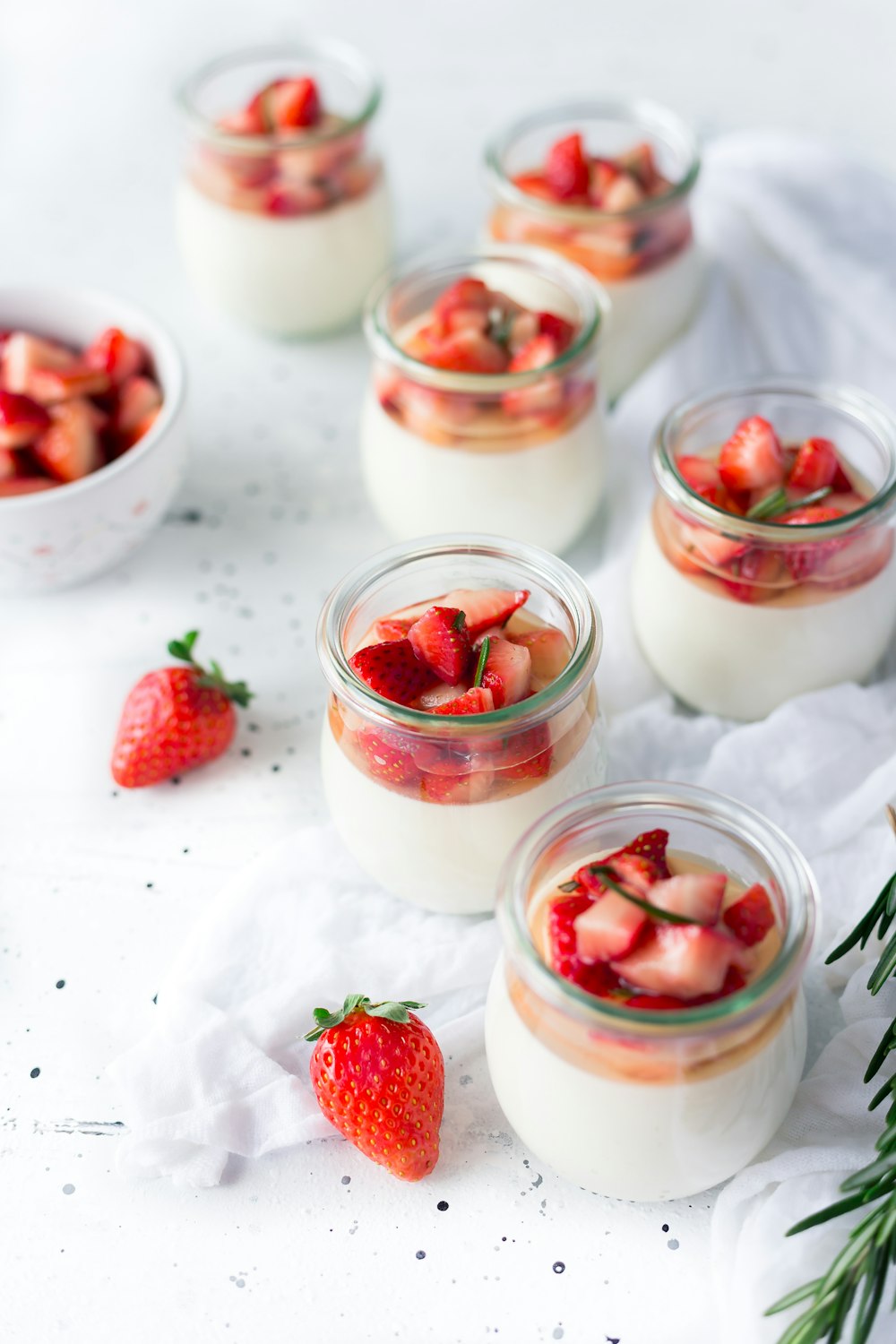Jars of strawberry panna cotta